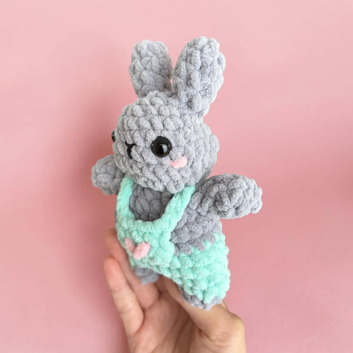 bunny in overalls with tiny carrot — image 8 of 9
