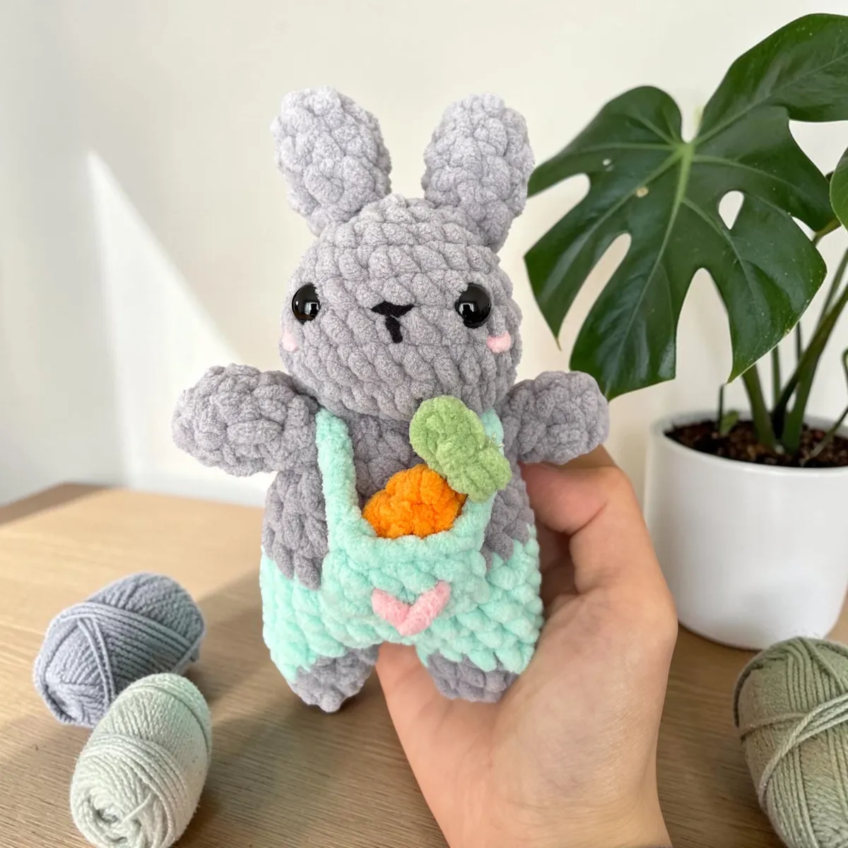 bunny in overalls with tiny carrot — image 1 of 9